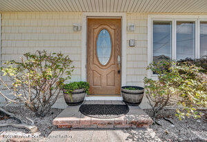108 Caldwell Road Barnegat, NJ 08005 - Photo 4 of 55 a view of a two chair in a patio