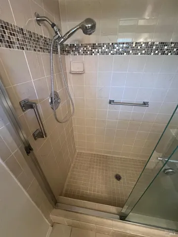 a bathroom with a sink and mirror