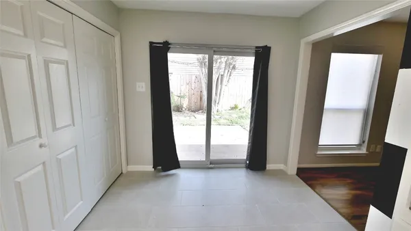 an empty room with windows