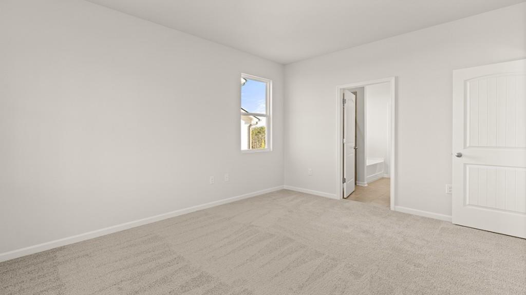 4083 Peregrine Way Gainesville, GA 30506 - Photo 17 of 34 an empty room with windows