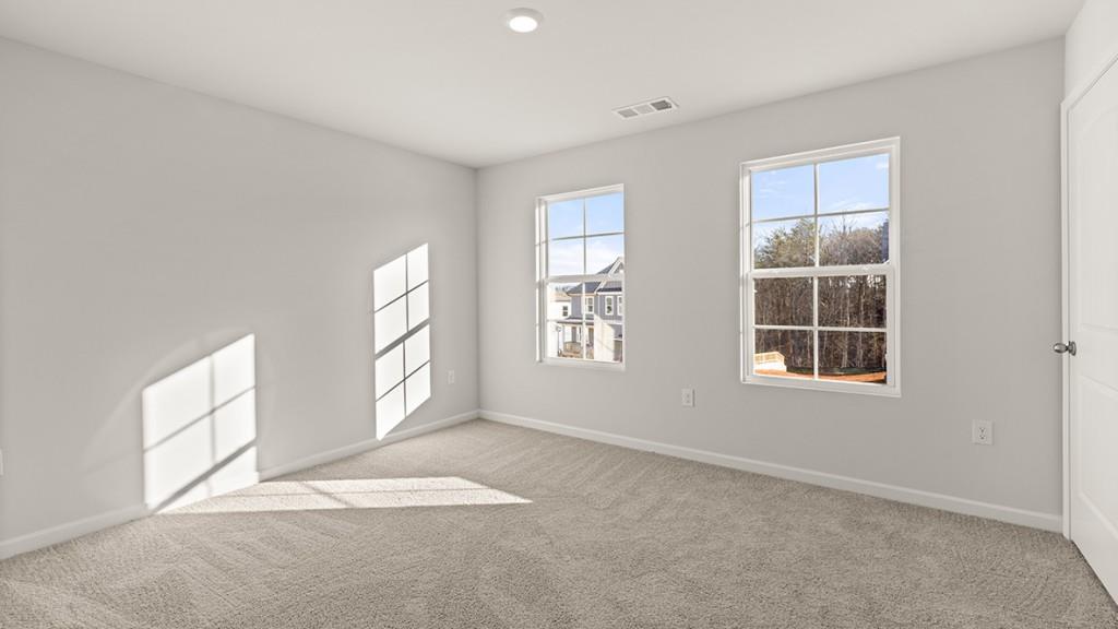 4083 Peregrine Way Gainesville, GA 30506 - Photo 26 of 34 an empty room with windows