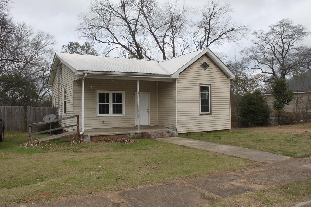 2 Wilson Street Manchester, GA 31816 - Photo 1 of 18 a house with trees in the background