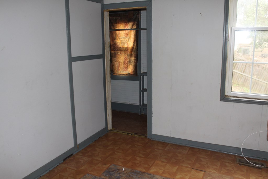 2 Wilson Street Manchester, GA 31816 - Photo 13 of 18 an empty room with a window