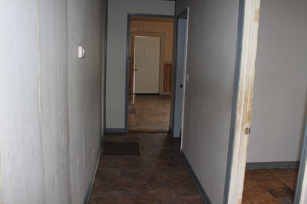 2 Wilson Street Manchester, GA 31816 - Photo 16 of 18 a view of a hallway with wooden floor