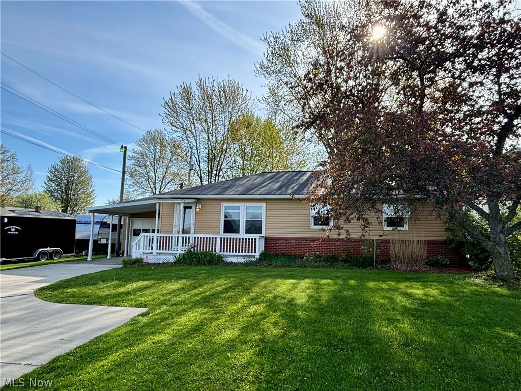 2421 Burbank Road Wooster, OH 44691 - Photo 2 of 23 Single story home with a porch and a front yard