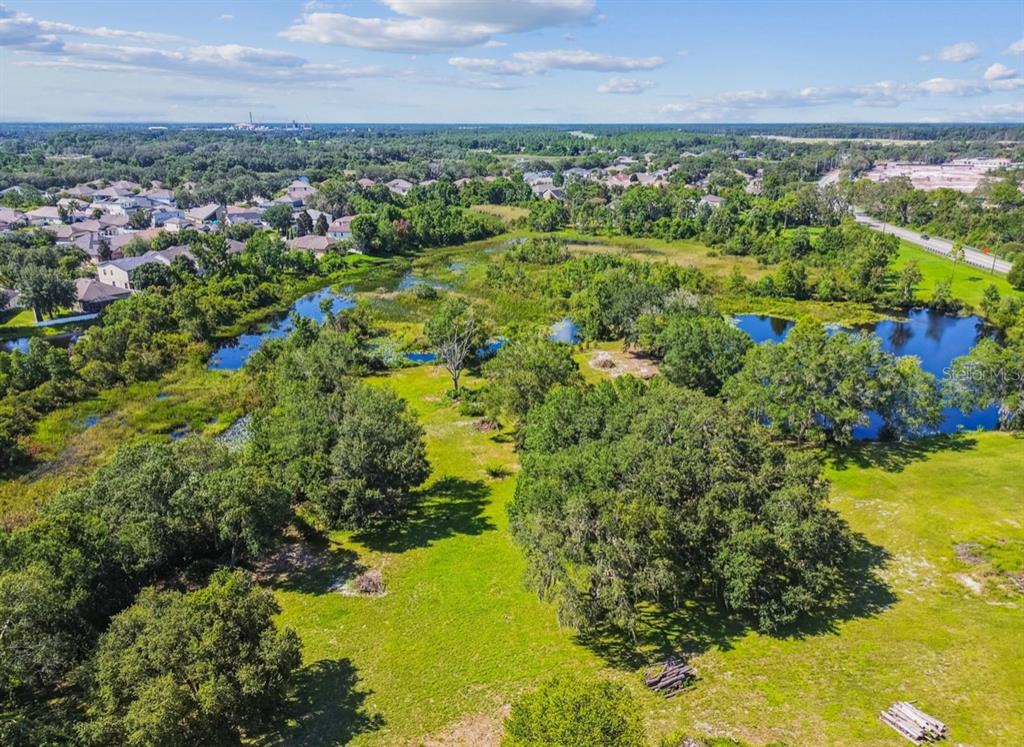 12321 Shady Hills Road Spring Hill, FL 34610 - Photo 27 of 30 a view of a lake with a city
