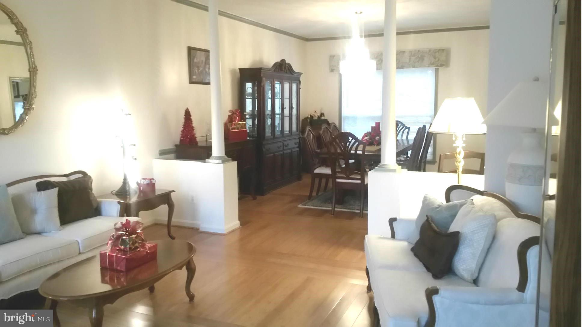 6540 Running Brook Road Manassas, VA 20112 - Photo 2 of 17 a living room with furniture and a large window