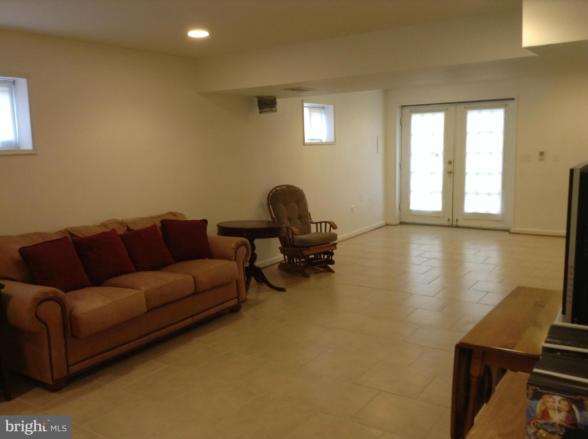 6540 Running Brook Road Manassas, VA 20112 - Photo 13 of 17 a living room with furniture and a window