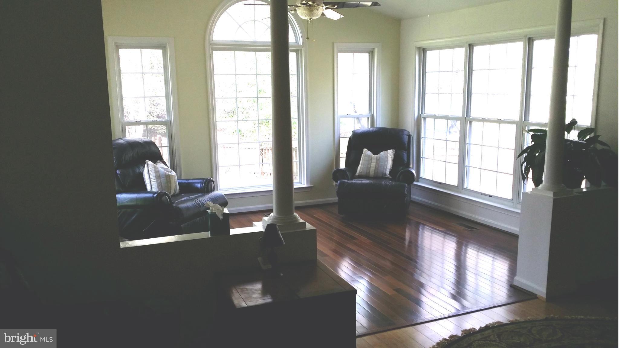 6540 Running Brook Road Manassas, VA 20112 - Photo 14 of 17 a view of a living room and a window