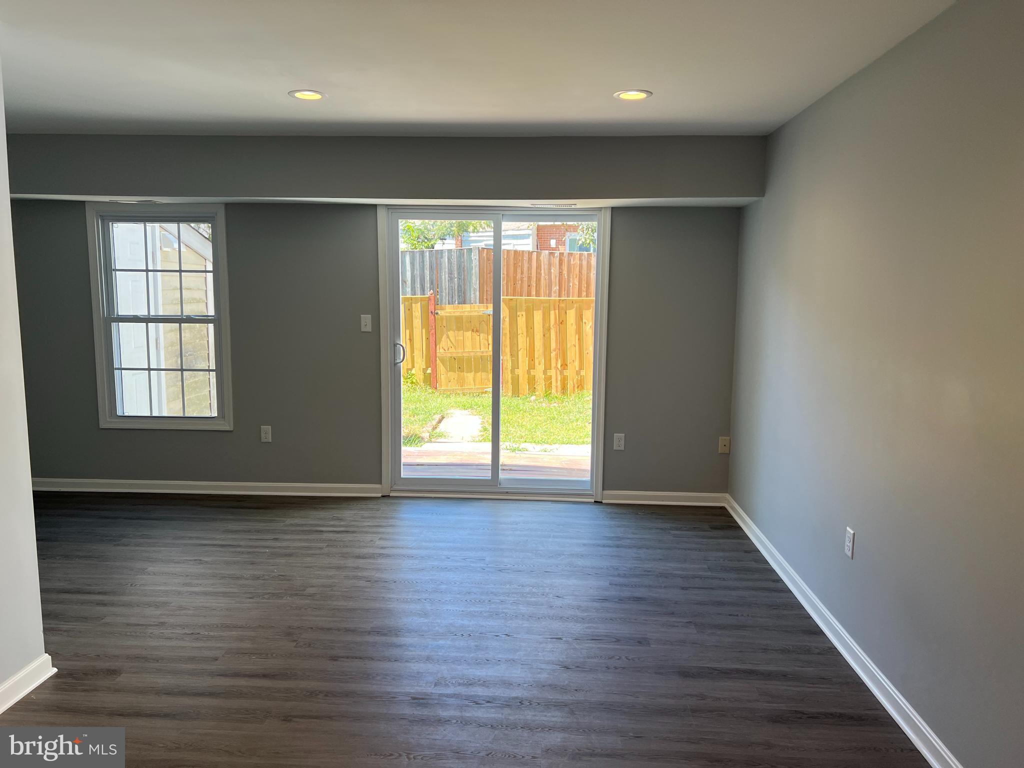3807 Port Hope Point Triangle, VA 22172 - Photo 4 of 22 an empty room with wooden floor and windows