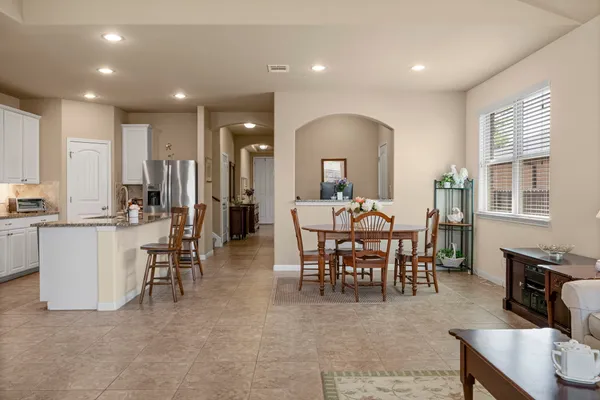 a view of a dining room with furniture