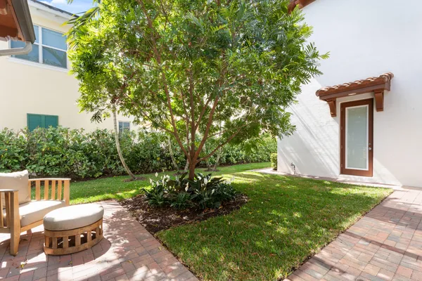 a backyard of a house with seating space