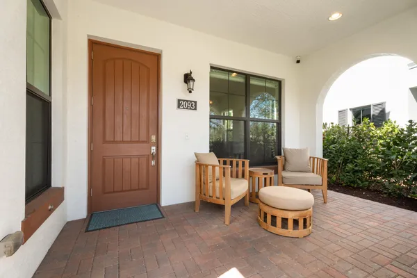 a outdoor space with patio furniture and a potted plant