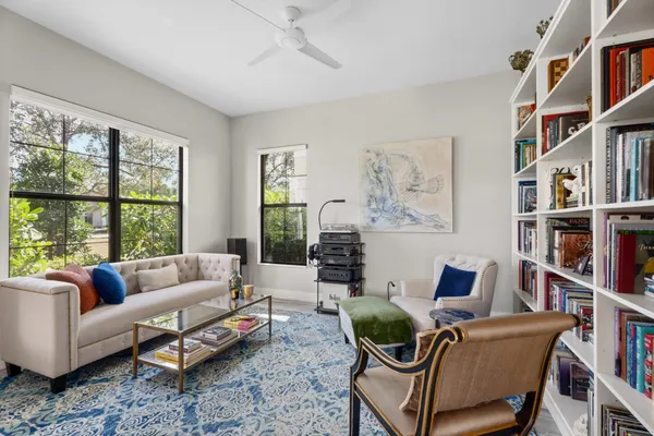 a living room with furniture and a window