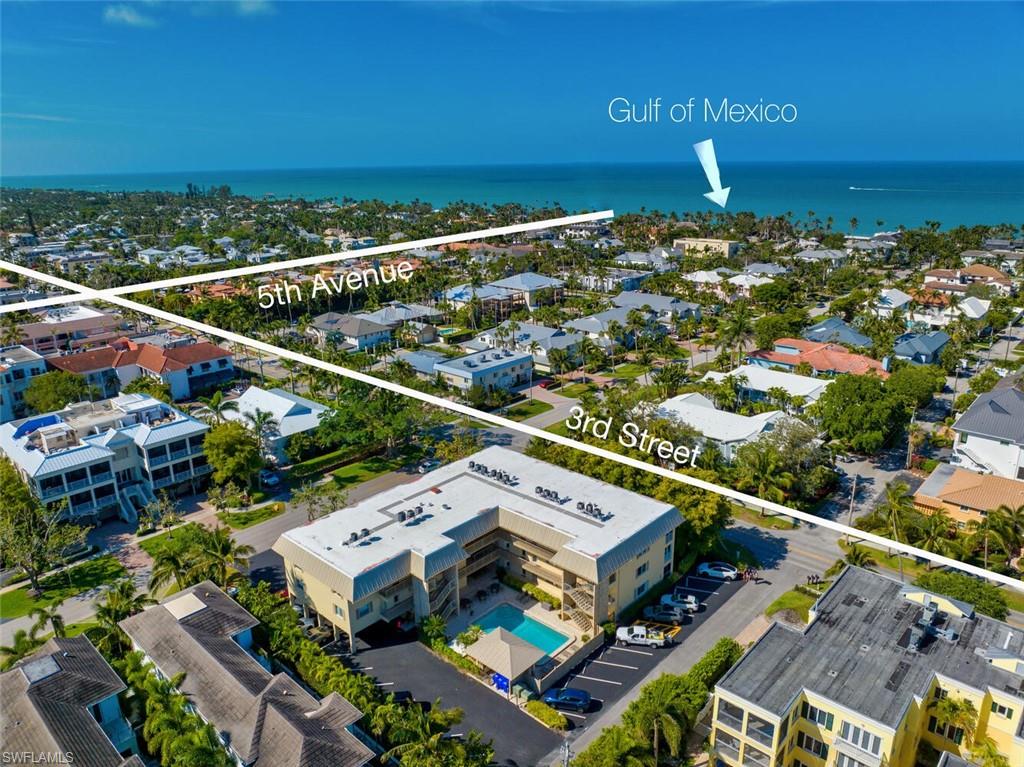 333 4th Avenue South, Unit 202 Naples, FL 34102 - Photo 2 of 16 a view of a balcony with an outdoor space