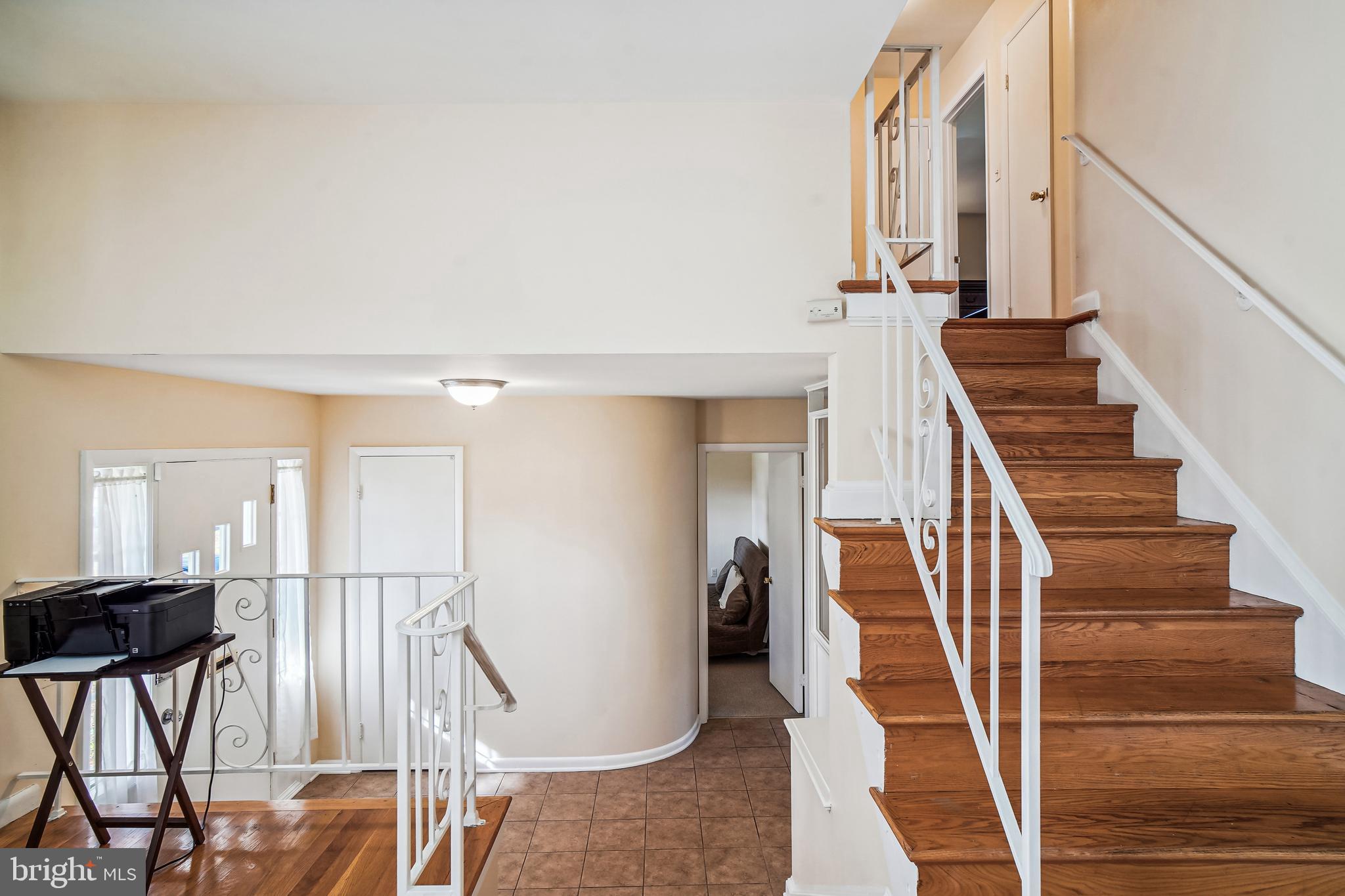5405 Manorfield Road Rockville, MD 20853 - Photo 17 of 34 Stairs to upper level bedrooms