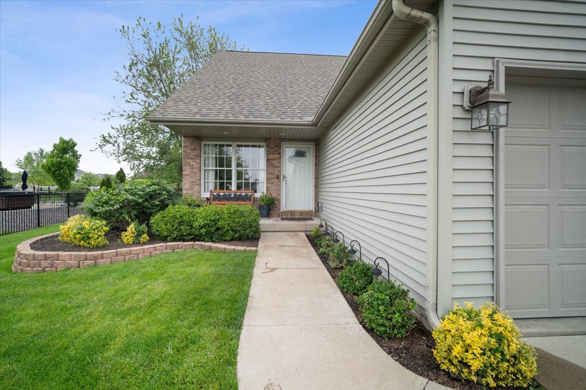 1728 Sunrise Point Normal, IL 61761 - Photo 3 of 29 a front view of a house with a yard