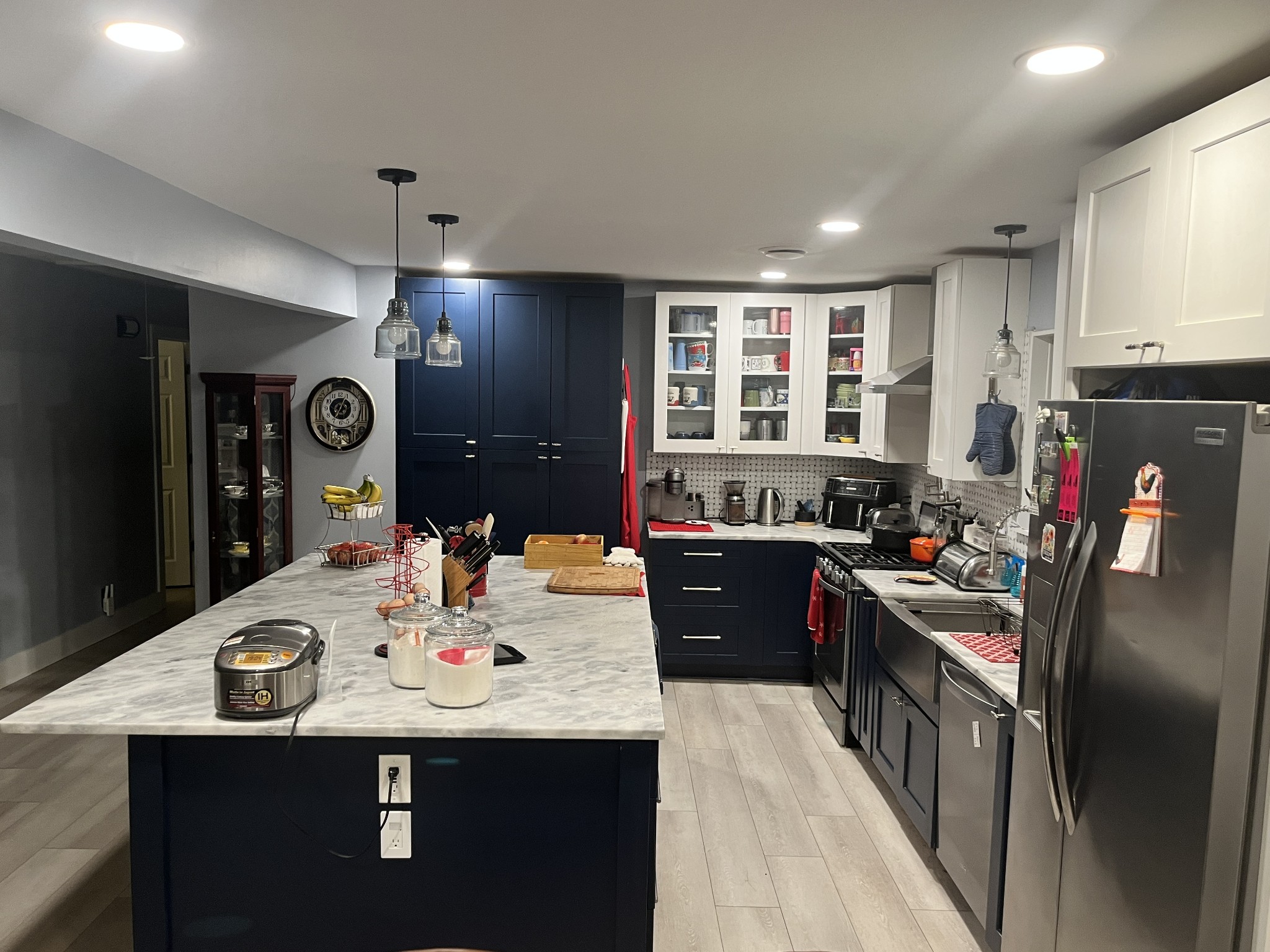 800 Del Rio Pike Franklin, TN 37064 - Photo 2 of 8 a kitchen with kitchen island granite countertop a sink stove and refrigerator
