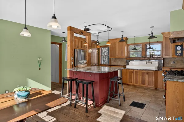 a very nice looking room with kitchen