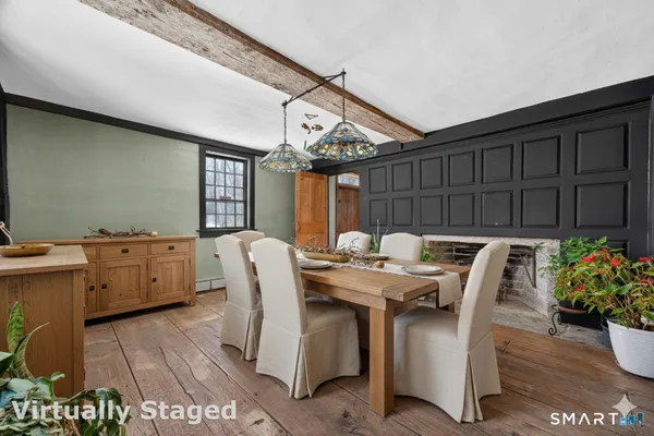 a view of a dining room with furniture