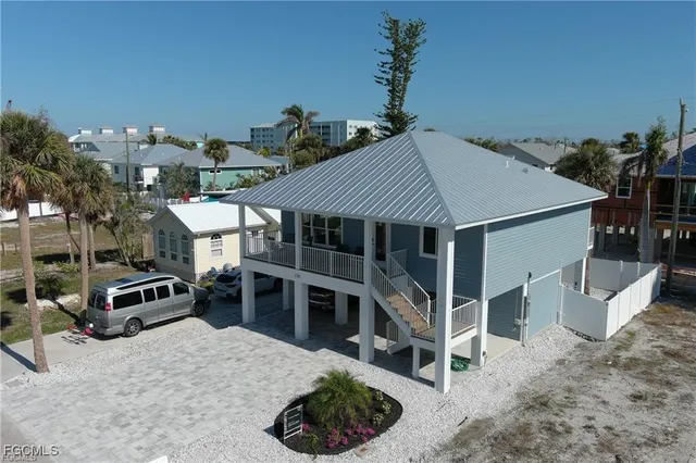 a view of a house with roof deck