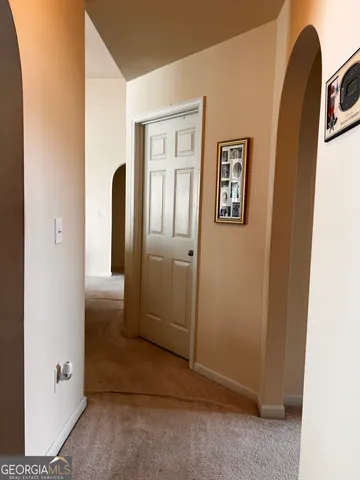 a view of a hallway with elevator