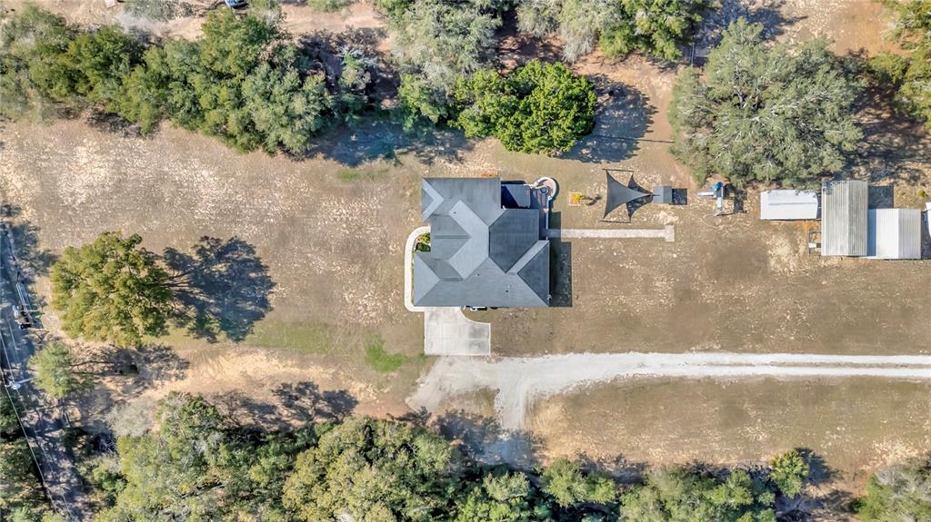 18611 Clark Road Altoona, FL 32702 - Photo 11 of 48 an aerial view of a house with yard