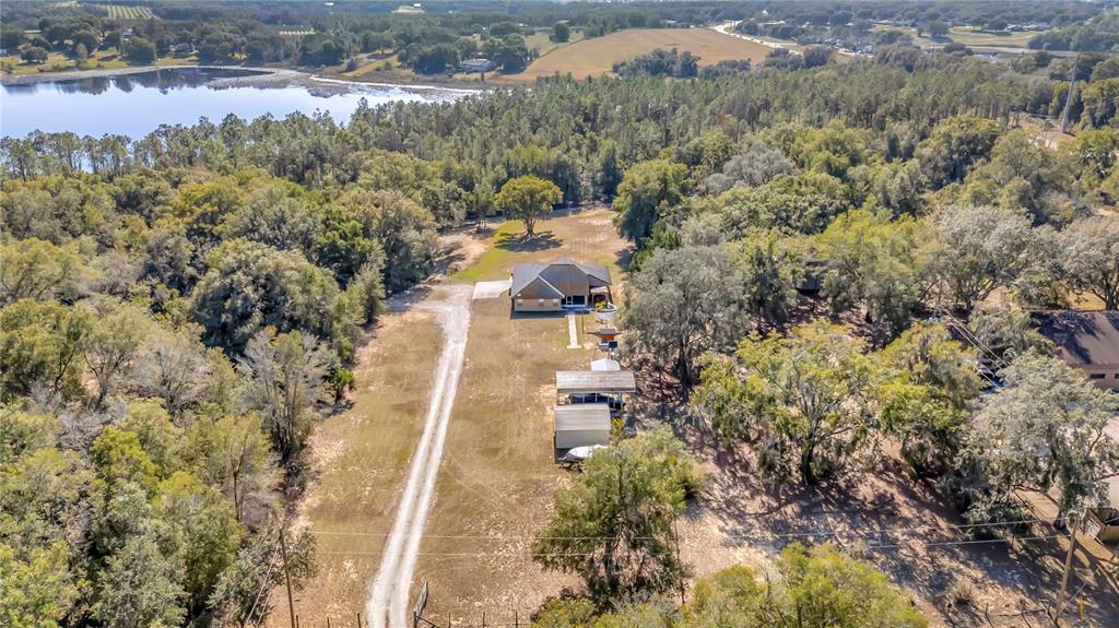 18611 Clark Road Altoona, FL 32702 - Photo 12 of 48 a view of a yard with trees