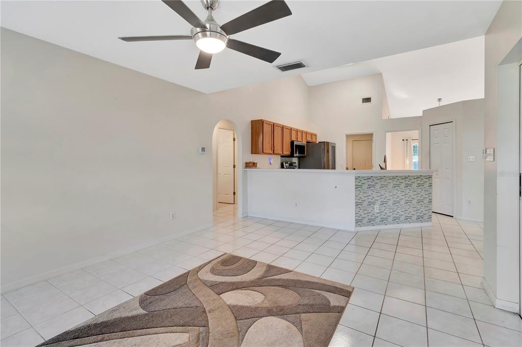 18611 Clark Road Altoona, FL 32702 - Photo 25 of 48 a living room with a couch
