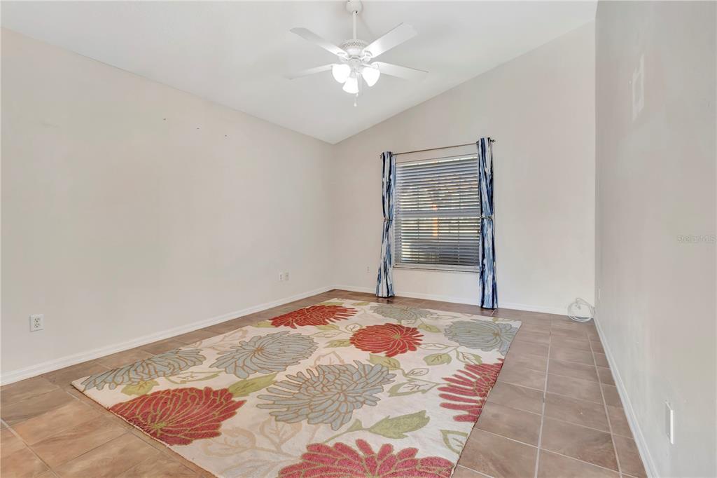18611 Clark Road Altoona, FL 32702 - Photo 28 of 48 a view of a bedroom with a natural light