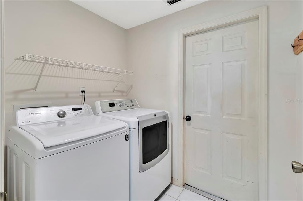 18611 Clark Road Altoona, FL 32702 - Photo 36 of 48 a utility room with dryer and washer