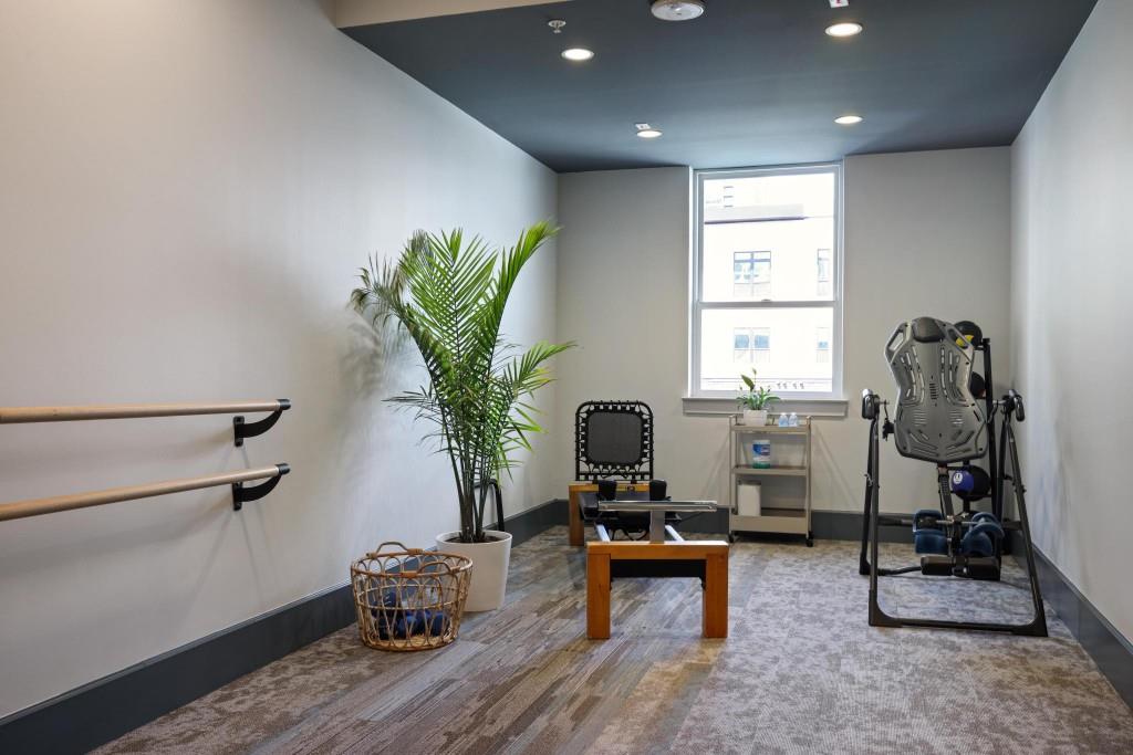 775 Juniper Street Northeast, Unit 602 Atlanta, GA 30308 - Photo 39 of 40 a room with furniture and a potted plant