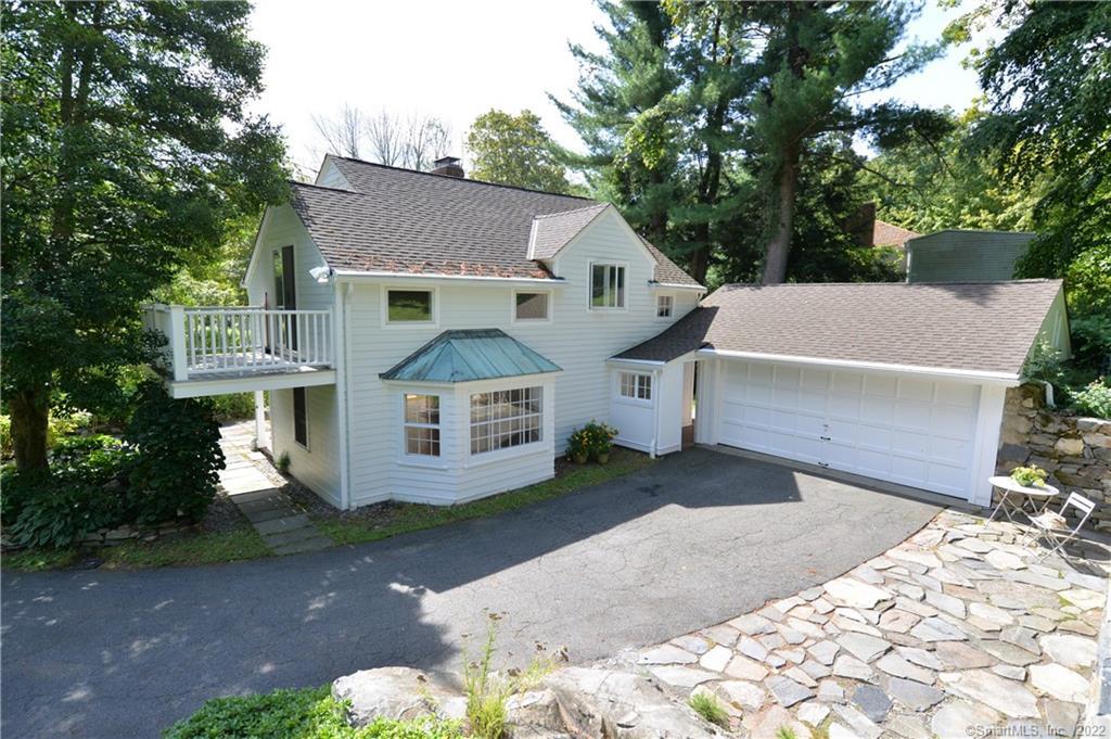 95 Peaceable Street Redding, CT 06896 - Photo 1 of 1 front view of a house with a yard