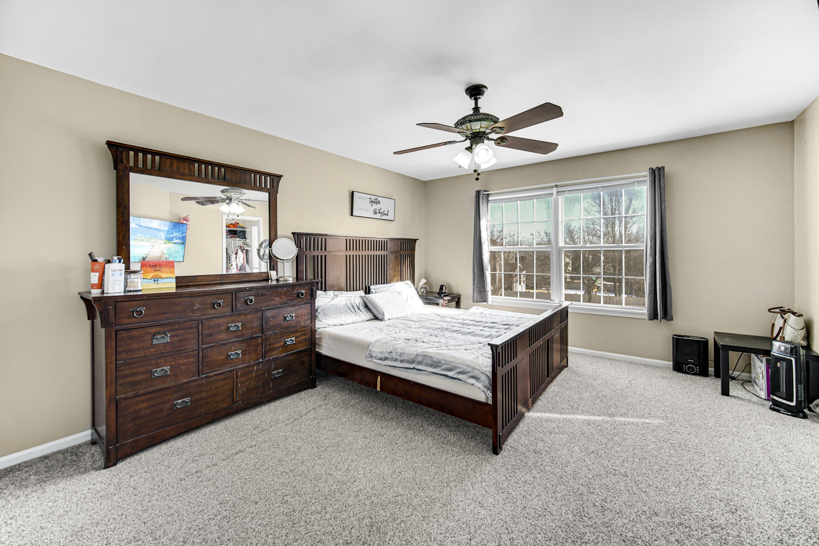 1384 Roxbury Drive Aurora, IL 60502 - Photo 11 of 24 a bedroom with a bed dresser and a window