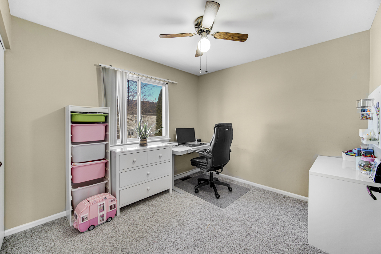 1384 Roxbury Drive Aurora, IL 60502 - Photo 13 of 24 a view of a workspace with furniture and a window