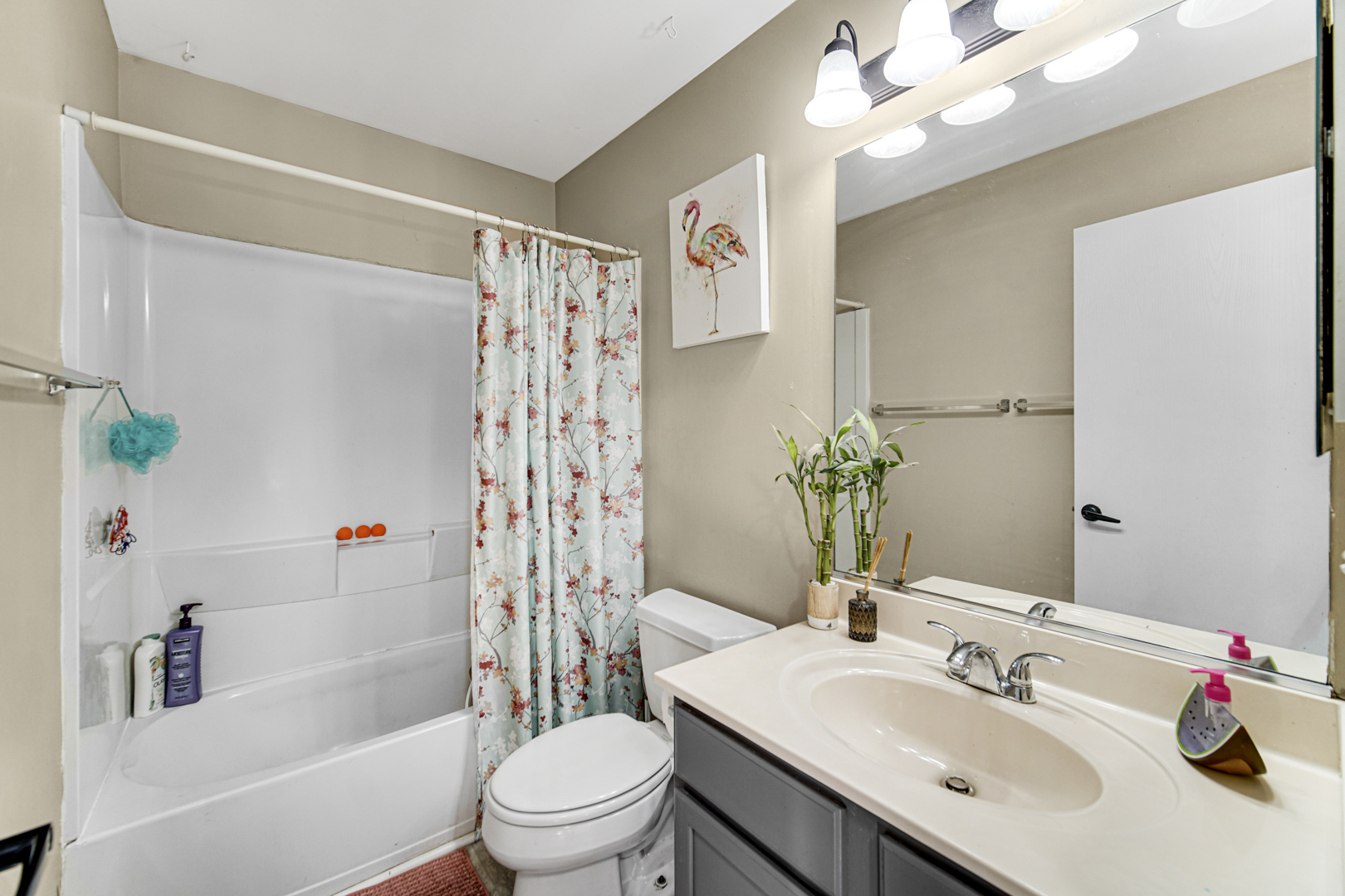 1384 Roxbury Drive Aurora, IL 60502 - Photo 14 of 24 a bathroom with a sink toilet tub and shower