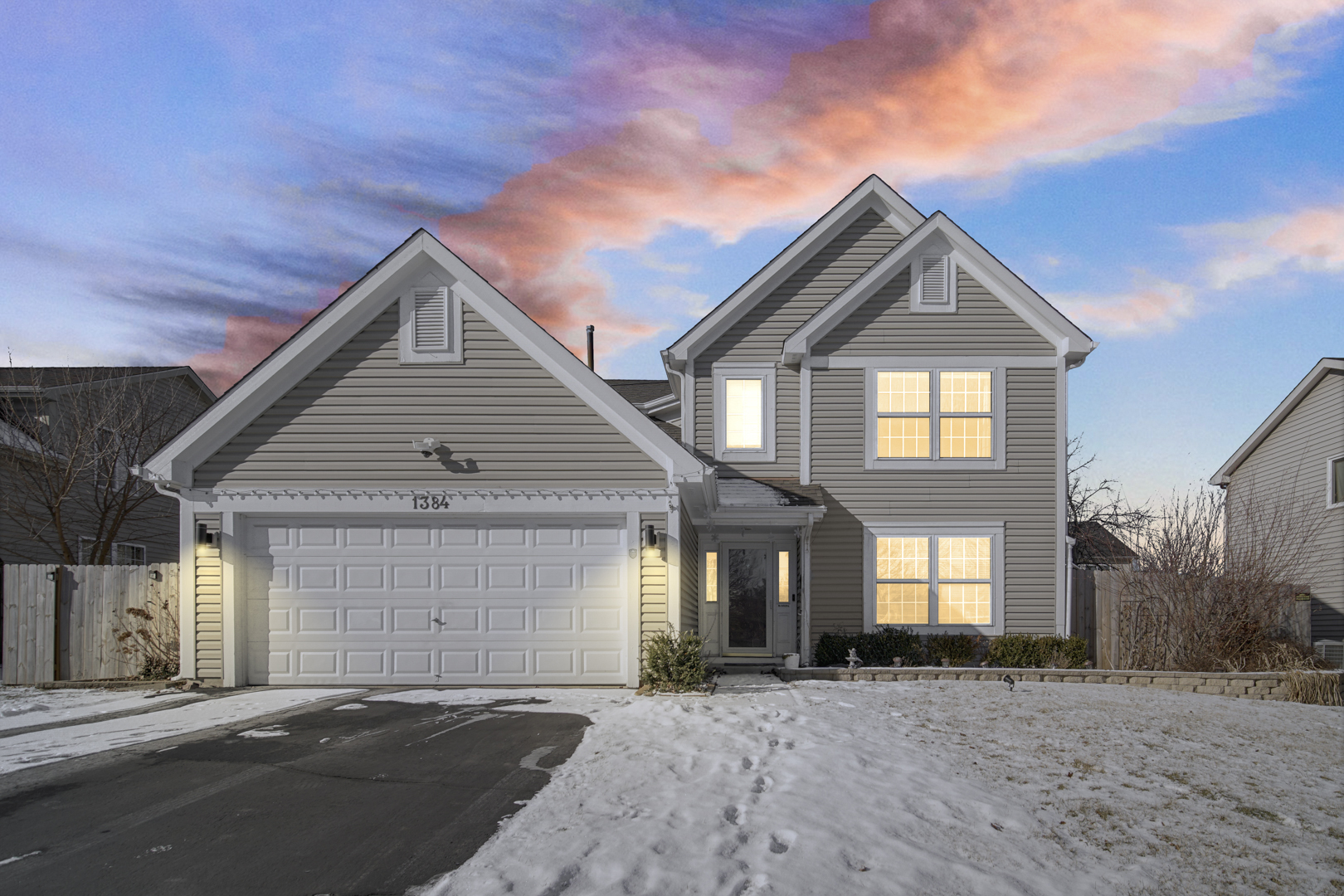 1384 Roxbury Drive Aurora, IL 60502 - Photo 2 of 24 a front view of a house with a yard