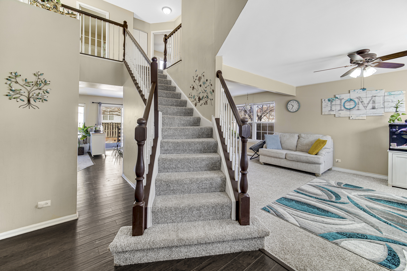 1384 Roxbury Drive Aurora, IL 60502 - Photo 4 of 24 a view of entryway and hall with wooden floor