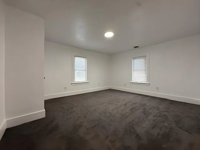 a view of an empty walk in closet
