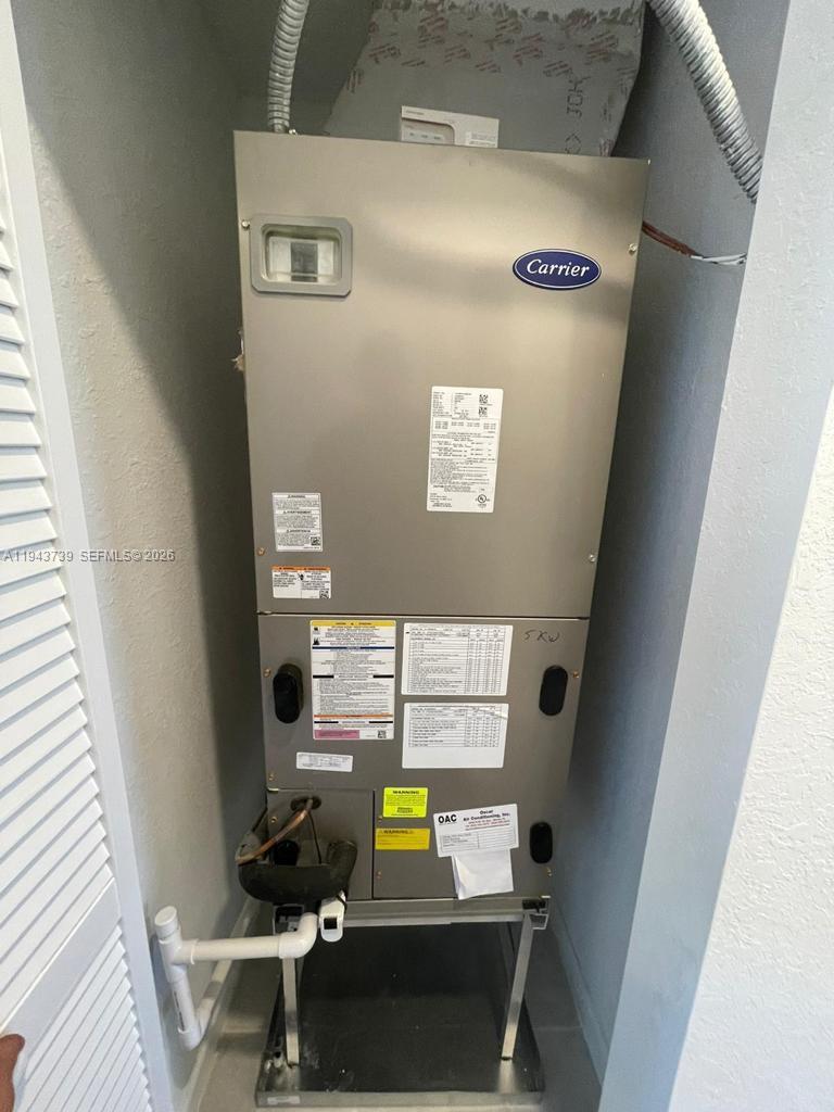 2634 Southeast 11th Court, Unit 2634 Homestead, FL 33035 - Photo 19 of 20 a view of washer and dryer