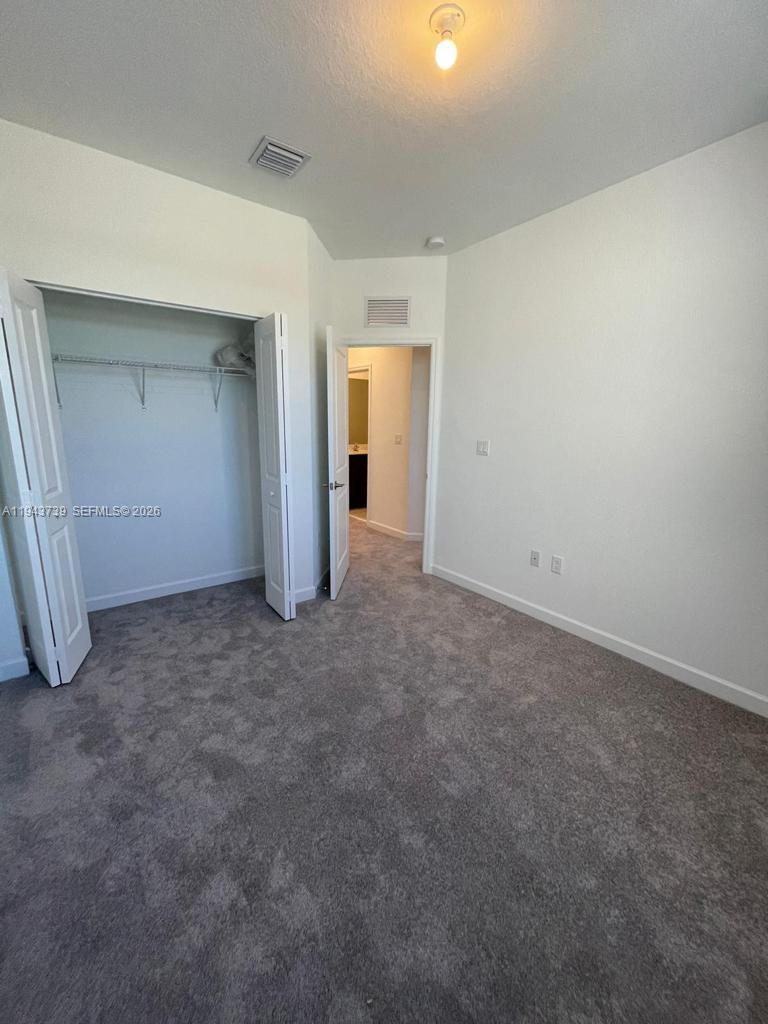 2634 Southeast 11th Court, Unit 2634 Homestead, FL 33035 - Photo 7 of 20 a view of empty room