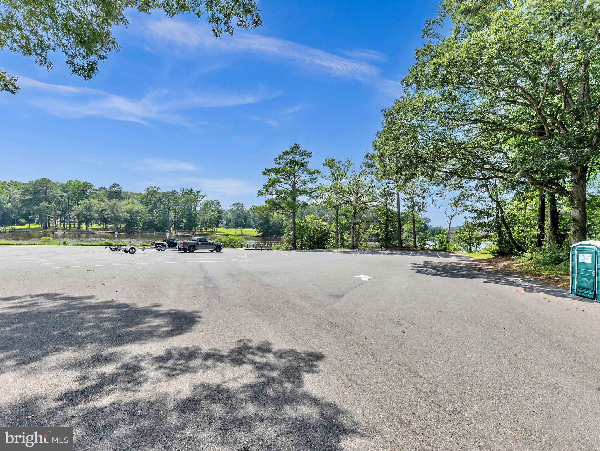 12623 Shell Mill Road, Unit 54 Bishopville, MD 21813 - Photo 24 of 24 a view of a road with a building in the background