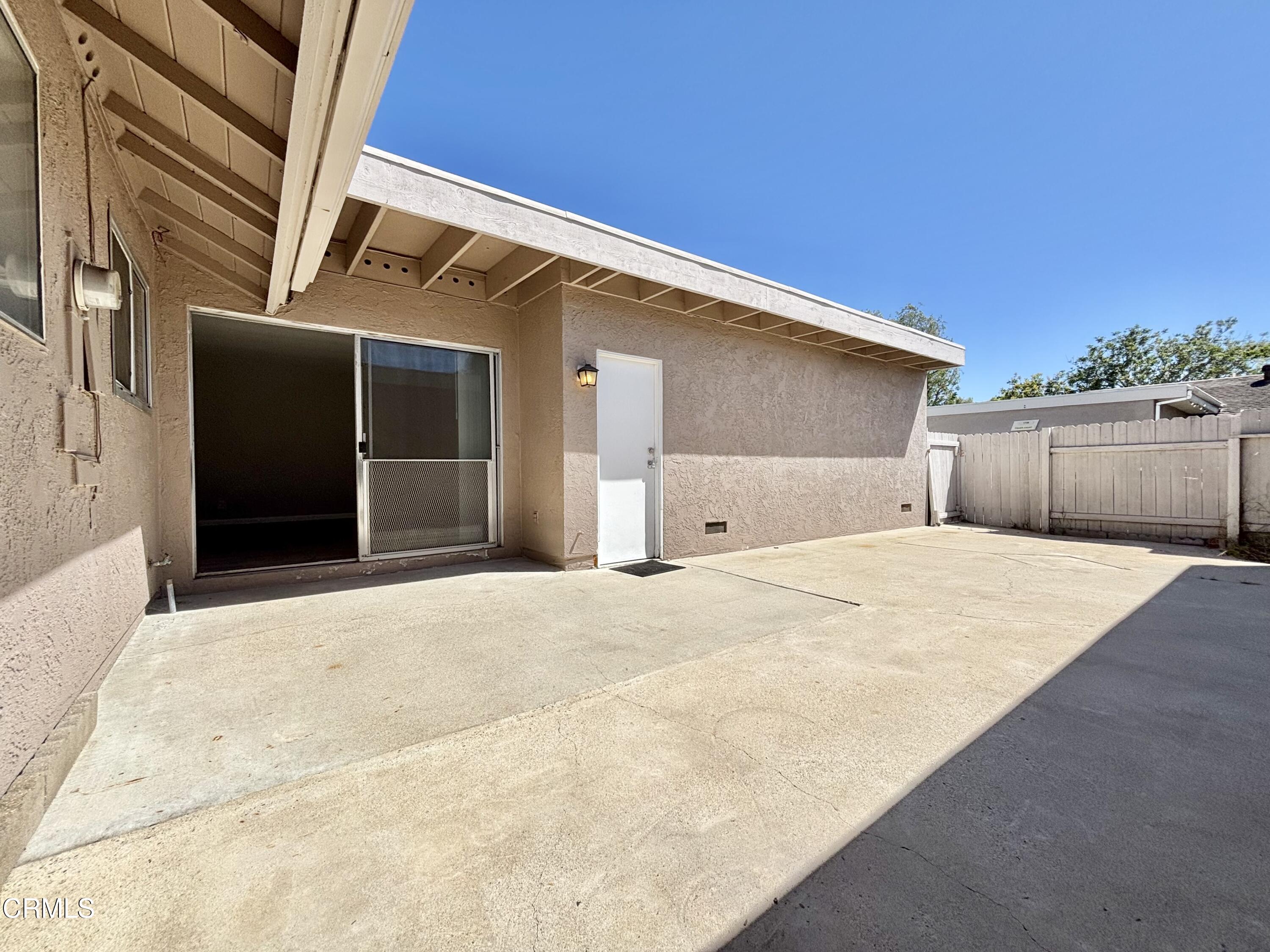 3604 Ketch Avenue Oxnard, CA 93035 - Photo 11 of 38 a front view of a house with a garage