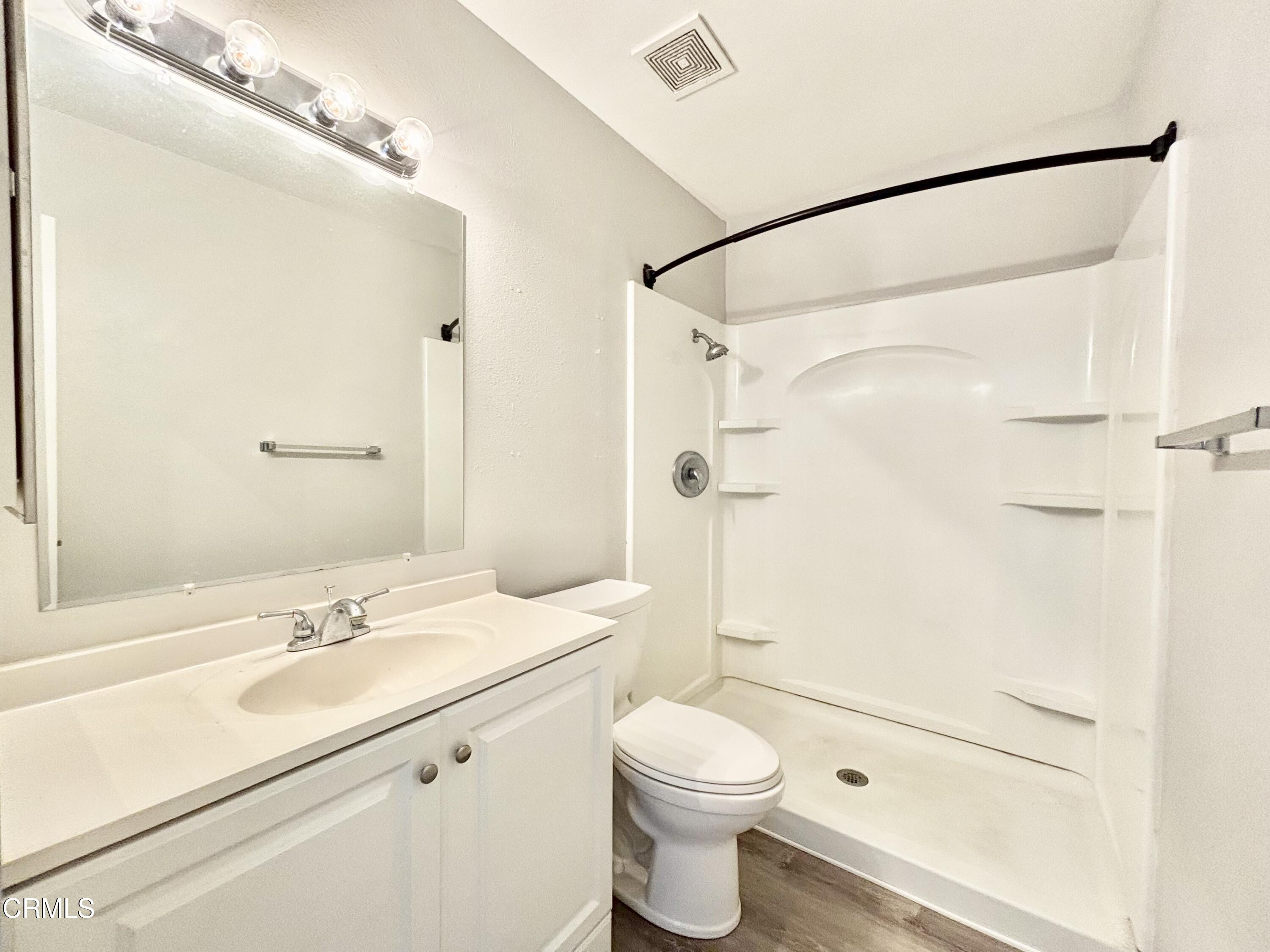 3604 Ketch Avenue Oxnard, CA 93035 - Photo 18 of 38 a bathroom with a sink vanity granite toilet and shower