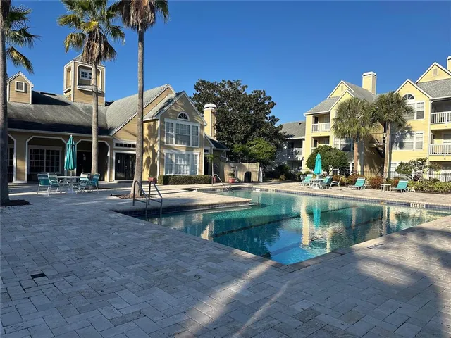 a view of a water fountain in front of building