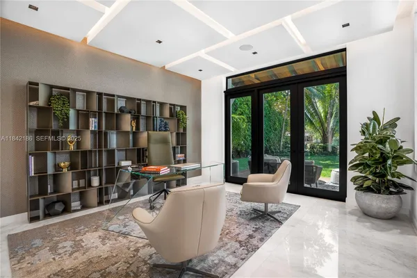 a living room with furniture fireplace and flat screen tv