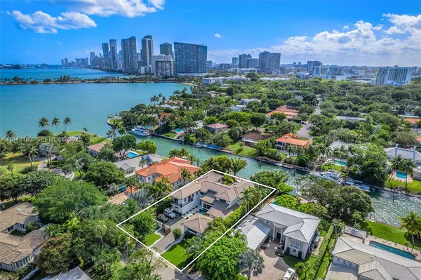 a living room with furniture fireplace and flat screen tv