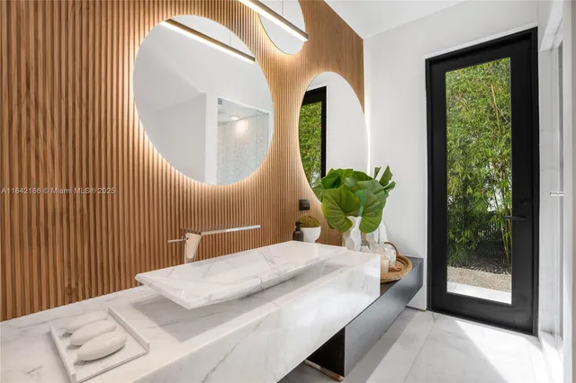 a view of a backyard with sitting area