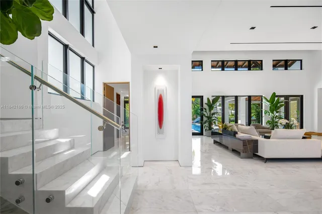 a view of a house with backyard sitting area and garden