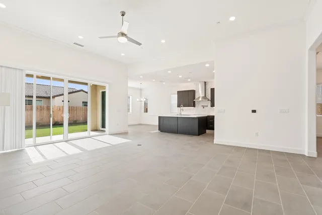 a view of a kitchen with furniture and a fireplace